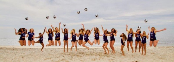 Women's Beach Volleyball Team Picture - Jumping