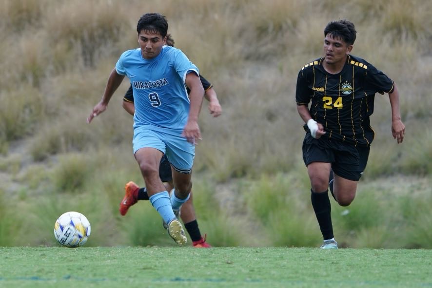 Jonathan Colin dribbles the soccer ball in a game early in the 2024 season.